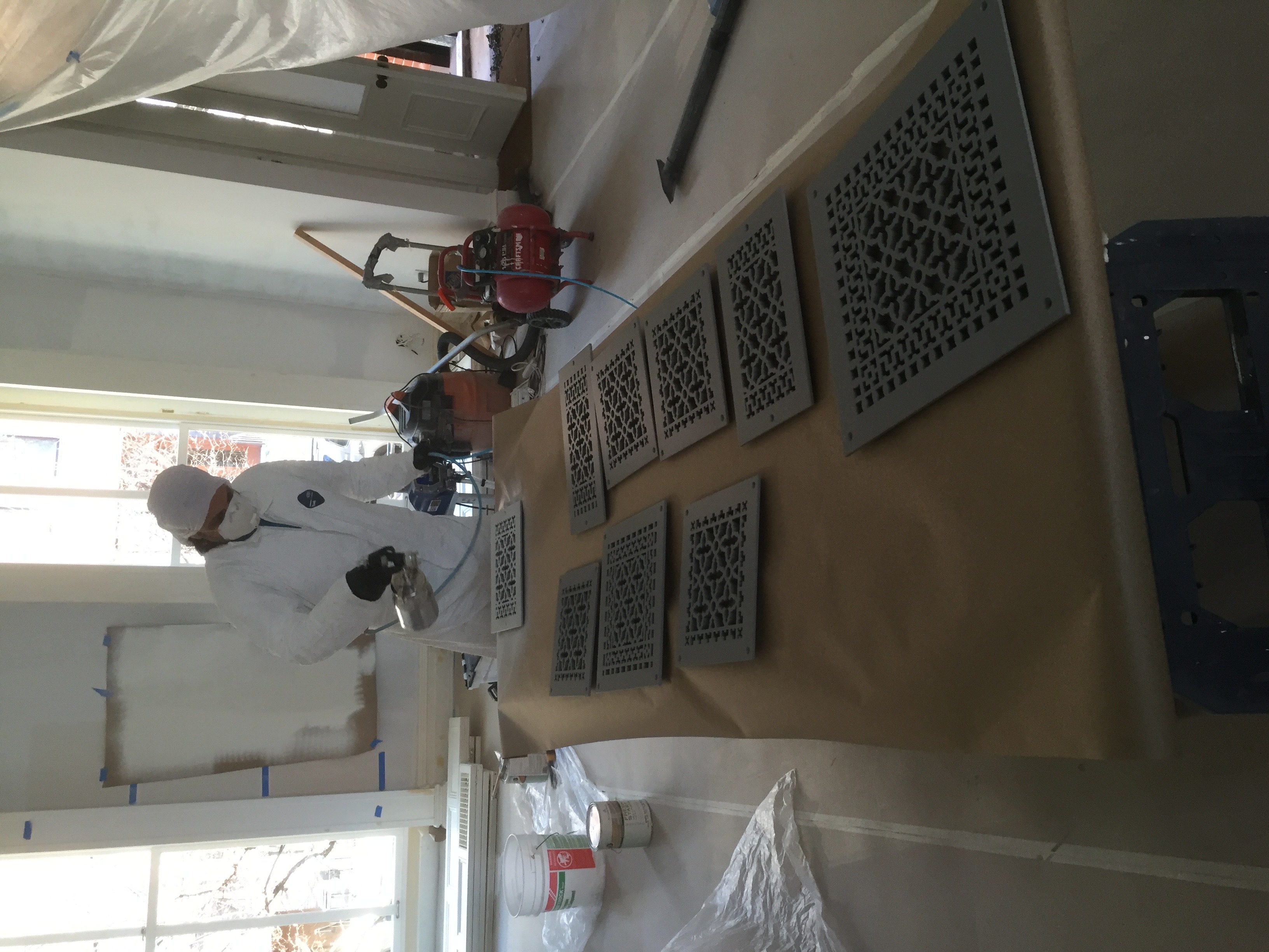 Spray painting decorative hardware